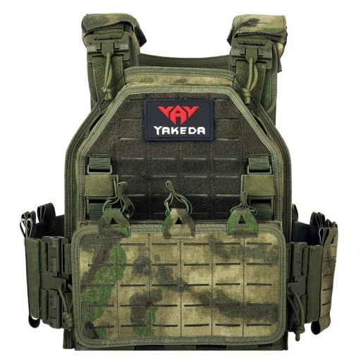 Justerbar taktisk vest med hurtigudløser Skjulte lommer med velcro 4 aftagelige puder Neutrale farver Omkreds 75-125 cm Skuldre 15-20 cm