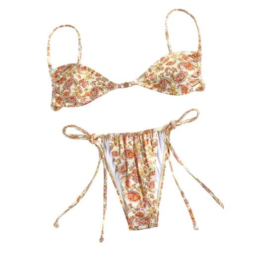 Kermanvärinen naisten bikini, jossa itämainen kukkakuvio. Sivuilla nauhat ja kuppien välissä kultaiset yksityiskohdat.