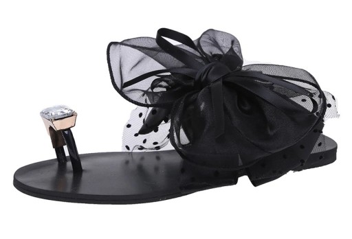 Kvinnors flipflops med rosett