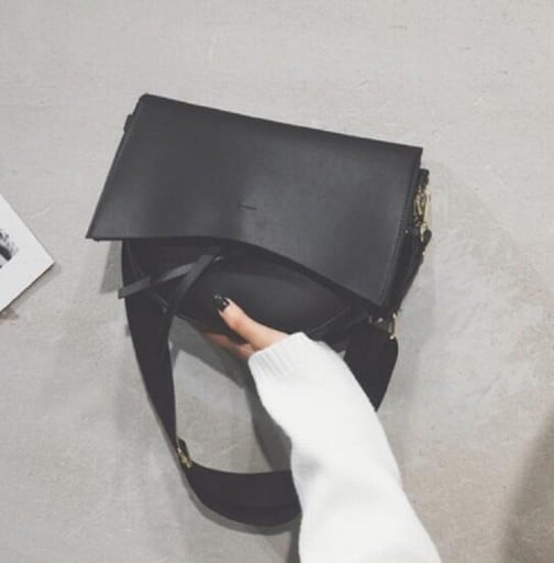 Ladies' crossbody handbag with a large flap and decorative strap Rounded shape Gold hardware PU leather 29 x 22 x 7 cm For everyday use