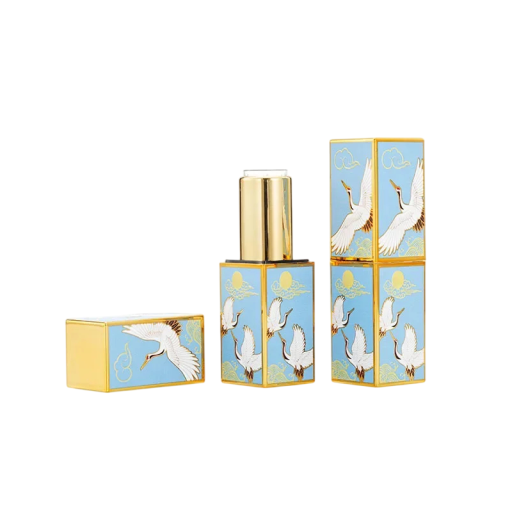 Leerer Lippenstiftbehälter mit magnetischem Verschluss 22×74 mm Kunststoff hellblau mit goldenen Elementen und Kranichmotiv für Kosmetik