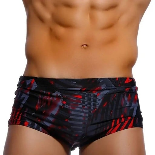 Maillots de bain slip pour hommes noirs à motifs en polyester coupe ajustée ceinture élastique maillots de bain à séchage rapide pour la plage