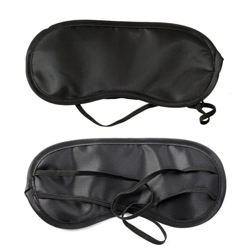 Máscara para dormir sobre los ojos hecha de material suave, moldeada, ligera, ideal para un sueño tranquilo.