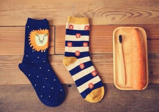 Meias longas com estampado de leões