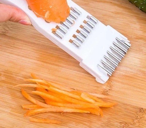 Mini râpe avec éplucheur