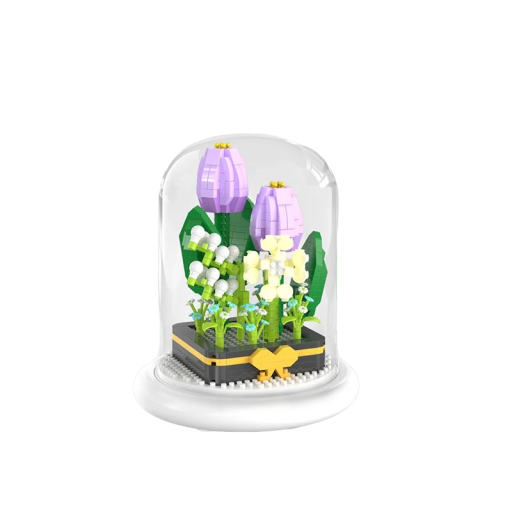 Minikokoinen rakennussarja, jossa violetti tulppaani valaisevalla pohjalla ja lasikannessa. 13,5 x 11,7 cm AAA-paristot. Kodinsisustus rakennussarjasta. Lasten taittolelu, 620 palaa.