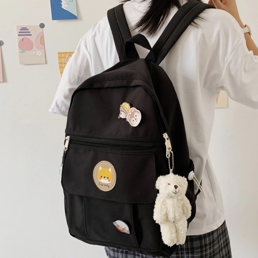 Mochila feminina com pendente de urso