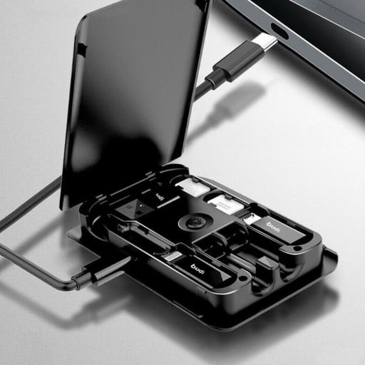 Opbevaringsboks med trådløs oplader 5 W Tre adaptere Lightning Micro USB og USB-A USB-C kabel 29 cm SIM-nål Mål 8,9 x 5,8 x 1,3 cm