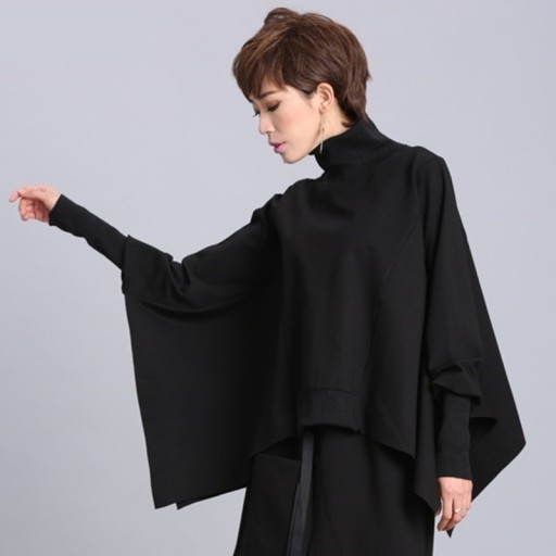 Oversized asymmetrisk rullekrave til kvinder
