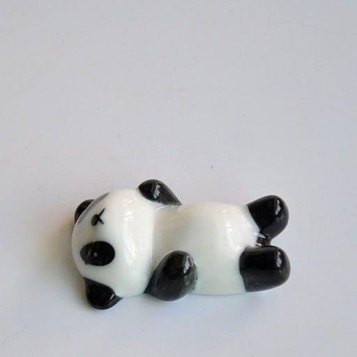 Panda-syömäpuikkoteline