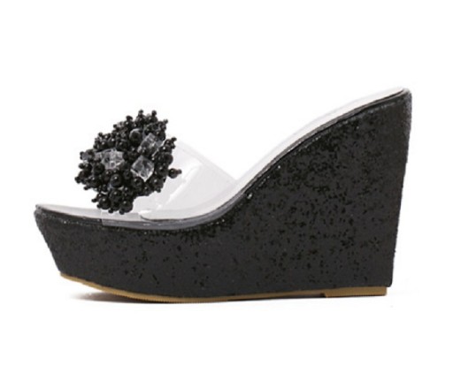 Pantofole da donna con platform alta e decorazione