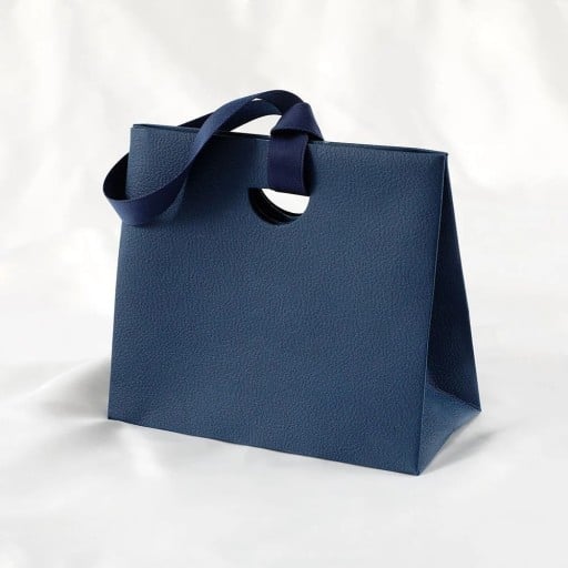 Paperinen lahjakassi koruille kahvalla 15,5 × 14,5 × 7,5 cm värikäs pussi sormuksille, korvakoruille tai pienille lahjoille