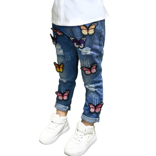 Pigejeans med farverige 3D-sommerfugle