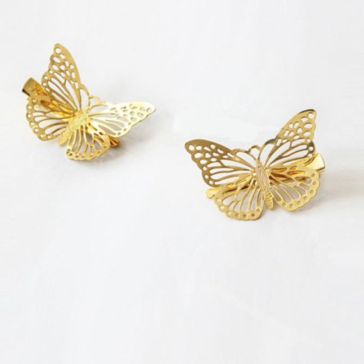 Pinzas para el pelo doradas con mariposas - 6 uds.