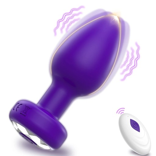 Plug anal eléctrico vibrador de silicona morado con control remoto para una estimulación intensa y un juego sensual. Embalaje discreto.