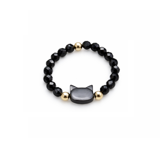 Pružný prsten s korálky a motivem kočky, černá nebo bílá varianta, drobné zlaté detaily, jemný hravý doplněk
