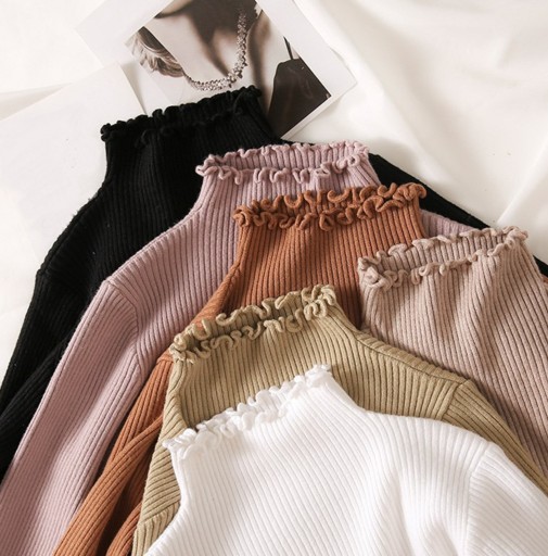Pull à col roulé avec volants