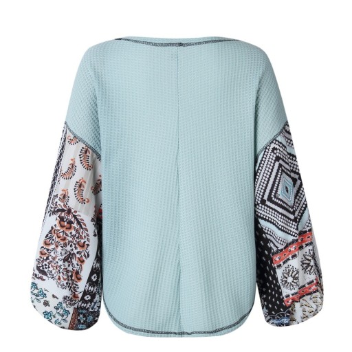 Pull femme avec des manches amples et à motifs