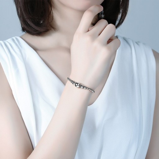 Pulseira ajustável feminina com bolas