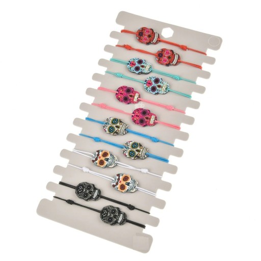 Pulseira com caveira 12 unid