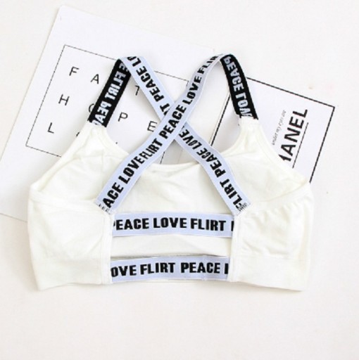 Reggiseno sportivo da ragazza con spalline incrociate