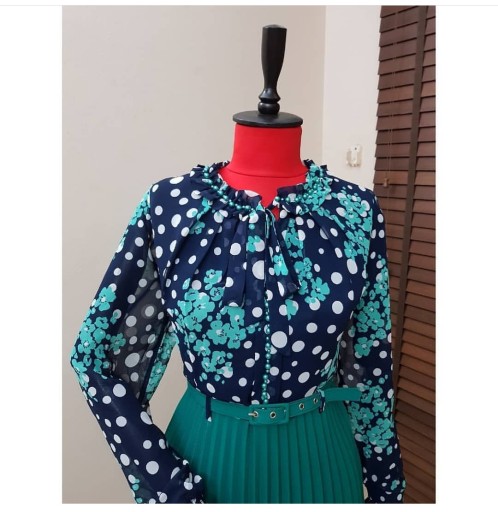 Robe à jupe plissée