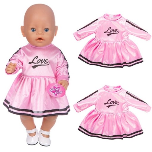 Robe rose pour poupée
