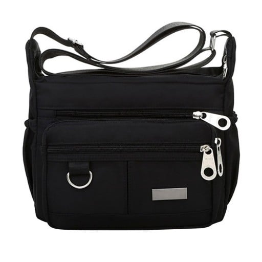 Sac à bandoulière pour femme en nylon et polyester Deux poches avant zippées Bandoulière réglable Dimensions 25 x 19 x 9 cm