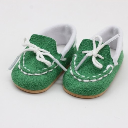 Schoenen met veters voor een pop