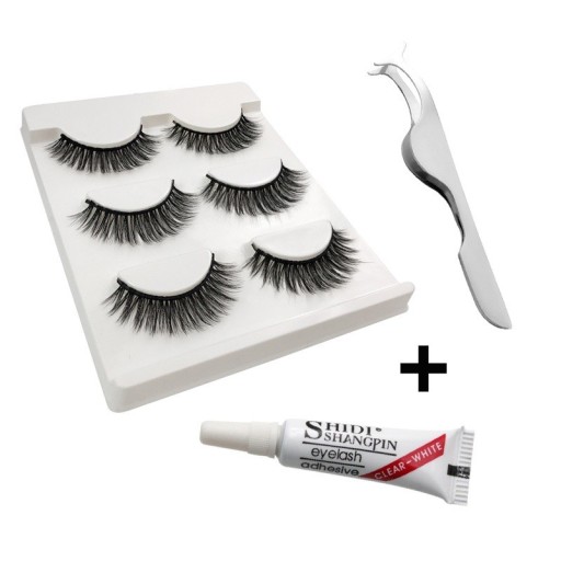 Set aus falschen Wimpern + Wimpernklammer und Kleber