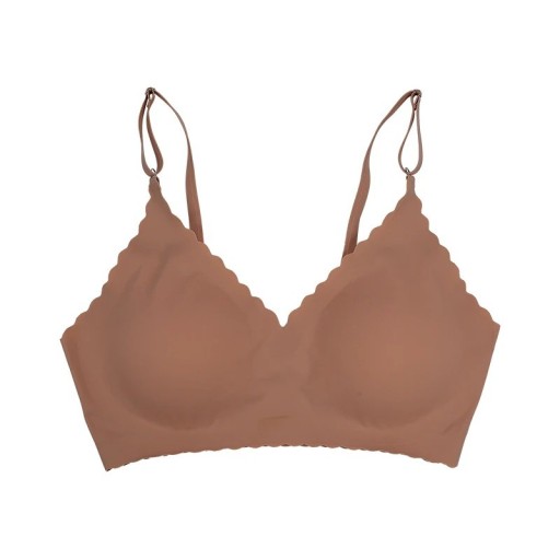 Sottile reggiseno senza cuciture con spalline sottili e bordo ondulato in polyamide leggero per un uso quotidiano e comfort