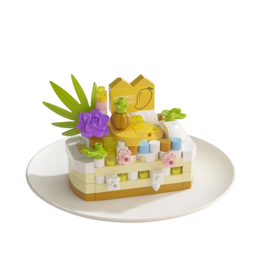 Stavebnica tortu w żółto-białym kolorze z ozdobą w kształcie mango 5,5 x 3,5 x 4,5 cm, kwiatami i liśćmi Szczegółowy miniaturowy tort z bogatą dekoracją