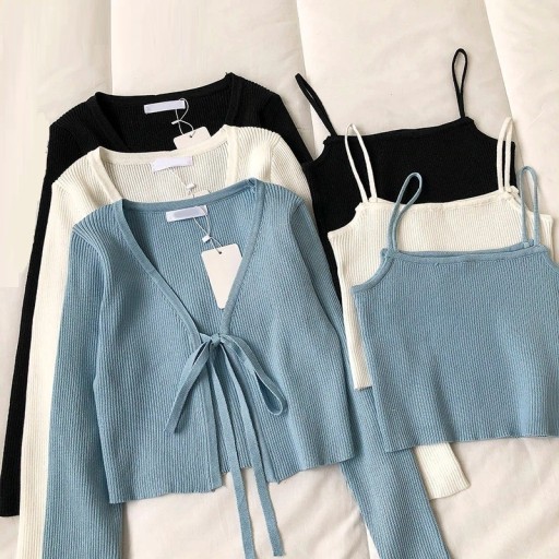 Top cropped e suéter feminino