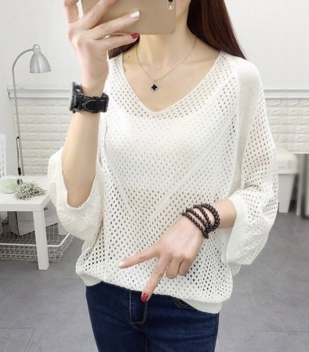 Top da donna traforato con maniche lunghe