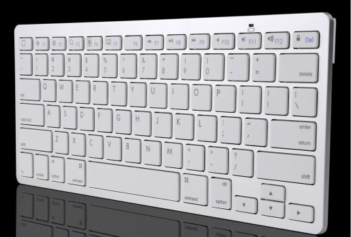 Trådløst bluetooth tastatur til iPad og MacBook Kompakt med 78 taster Engelsk mærkning Rækkevidde op til 10 m Hvid med sølvramme