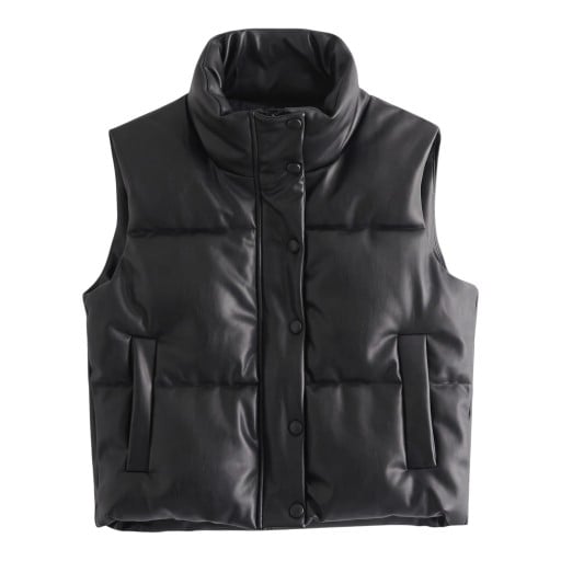 Veste pour femmes avec col montant et fermeture à boutons-pression sur toute la longueur avec des poches verticales sur les côtés et un matelassage horizontal