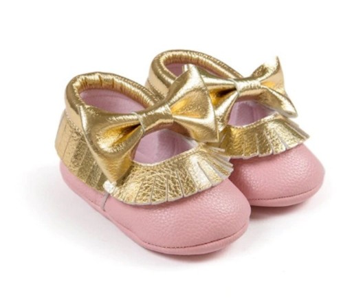 Zapatillas de piel para niña con volantes