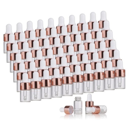 Zestaw 10 szklanych butelek 5 ml z kroplomierzem. Zakrętka w kolorze różowego złota. Opakowanie na serum, olejki eteryczne lub ekstrakty.