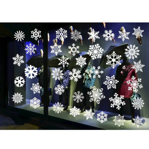 Zestaw białych świątecznych naklejek na okno 75 x 55 cm z folii PVC ze śnieżynkami Zimowa dekoracja okien Świąteczna ozdoba wnętrza