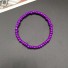 Armband aus Perlen lila