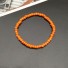 Armband aus Perlen orange