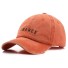 Cap mit der Aufschrift T267 orange