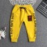 Chłopięce spodnie dresowe L2257 żółty