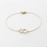 Damen-Kettenarmband mit Ringen golden