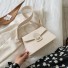 Damenhandtasche mit Krokodilledermuster M1745 creme