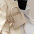 Damenhandtasche mit Schlangenledermuster M1387 creme