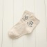 Damensocken mit Smiley-Gesicht beige