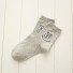 Damensocken mit Smiley-Gesicht grau