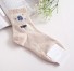 Damensocken mit Sonnensystemmotiven beige