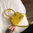 Dámska kožená kabelka malá žltá